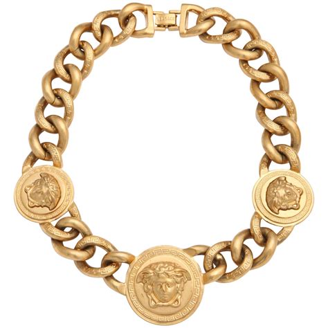 how much is versace one karat gold chain